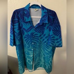 Mens button down polyester Hawaiian shirt.